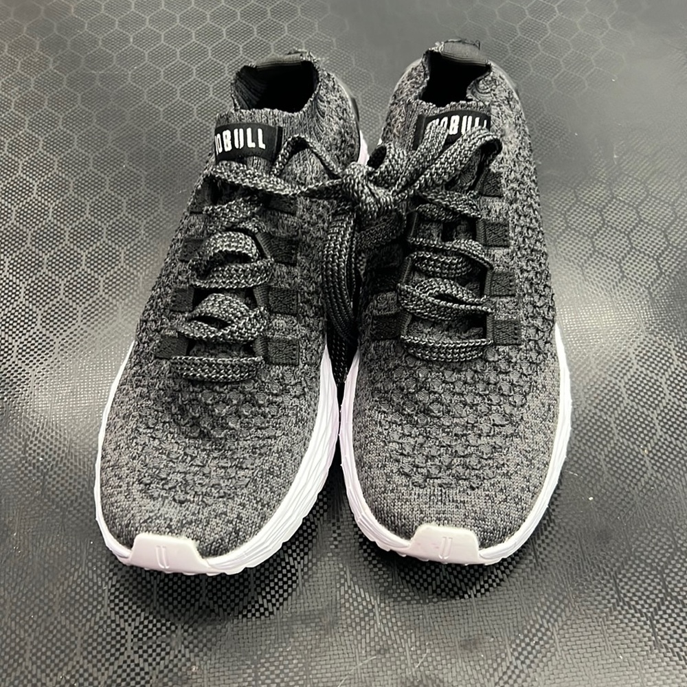 Size 8 brand new no bull running shoes.